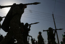 Долгожданное перемирие начало действовать в секторе Газа PalestinianHamasMilitantsTakePartInAnAnti-israelMilitaryShow