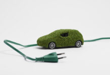 Ecological electric car on white background