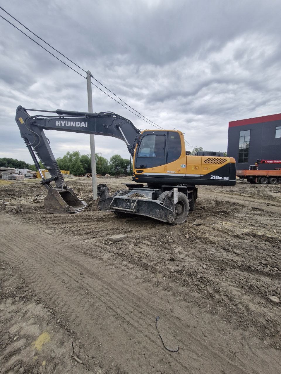 Аренда Экскаватора колёсного HYUNDAI R210W-9S