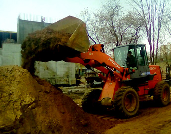 Аренда фронтального погрузчика Hitachi LX 110