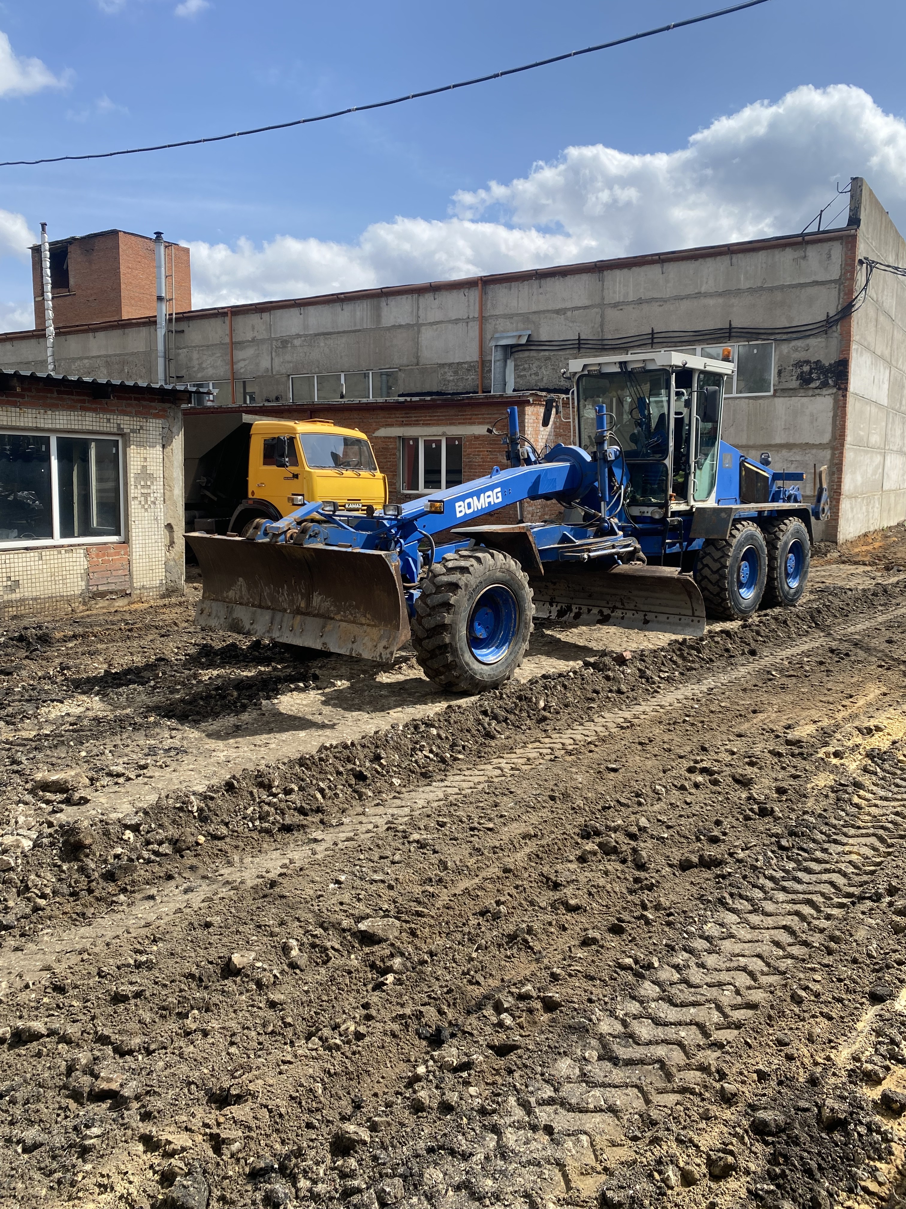 Аренда Грейдер 20 т 6*6 bomag с рыхлителем