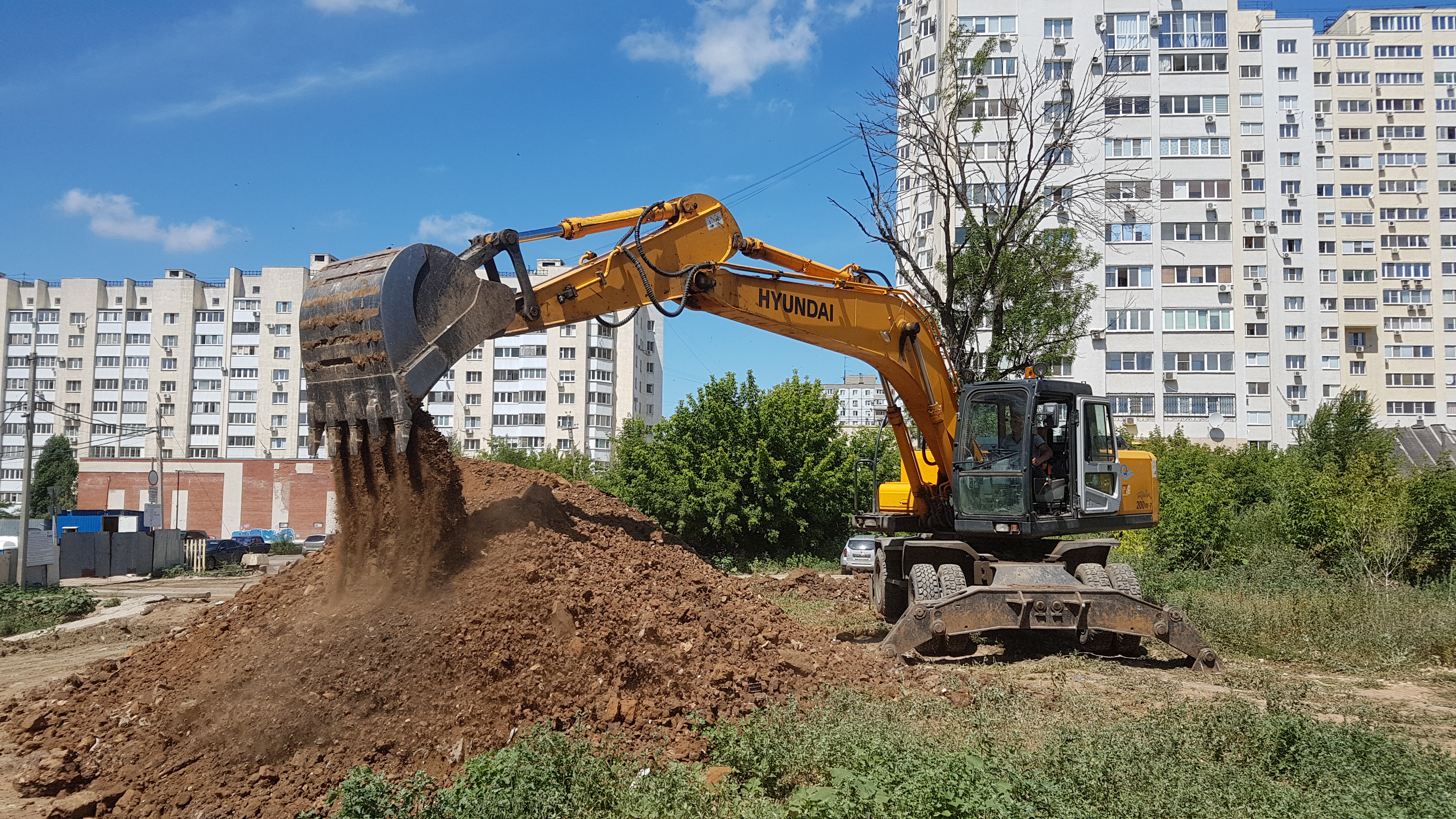 Аренда колесного экскаватора