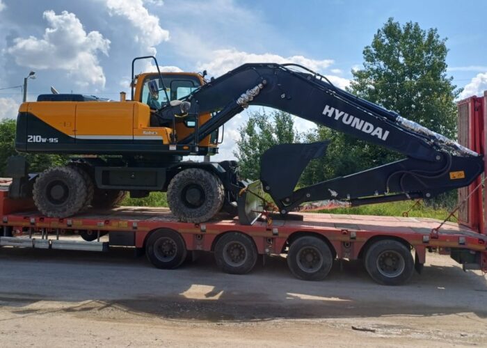 Аренда колесного полноповоротного экскаватора