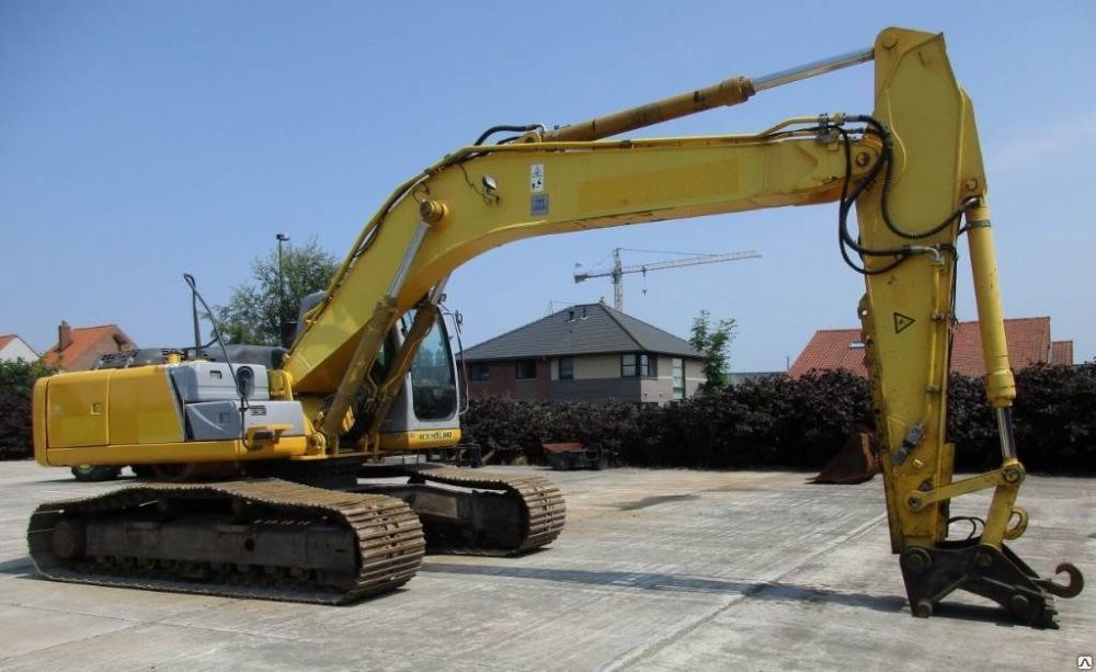 Аренда New Holland Kobelco E305 LC с буровой 16м
