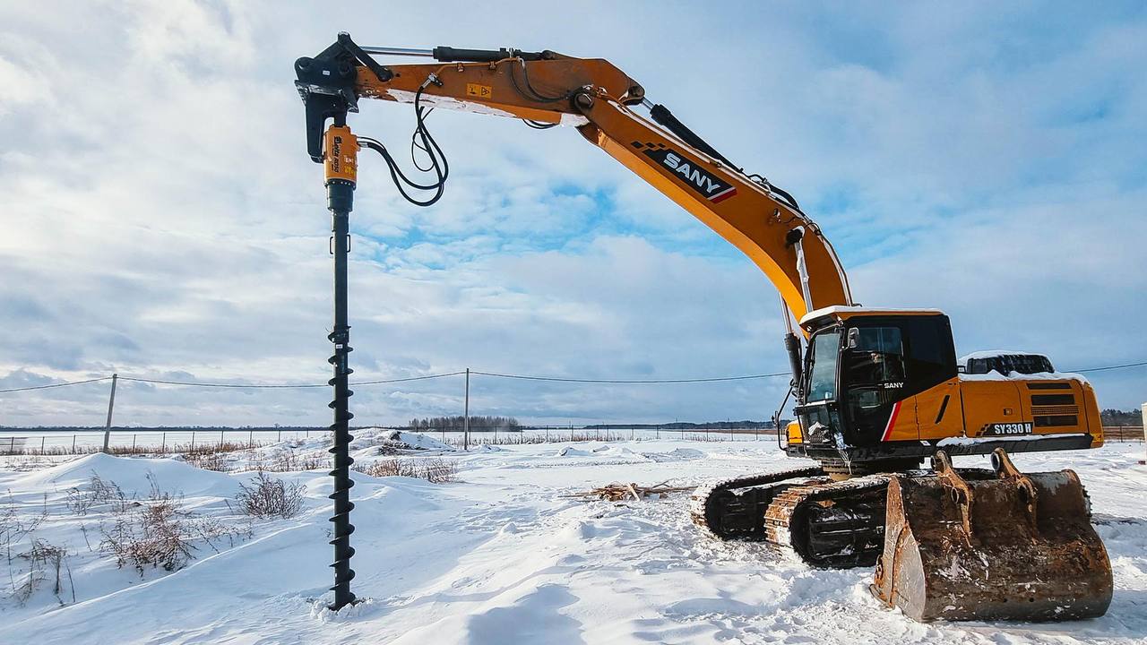 Аренда спецтехники экскаватора с ямобуром