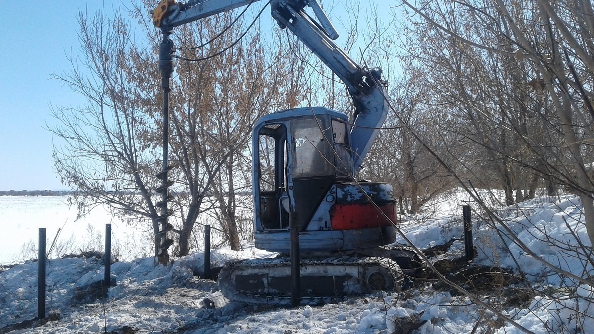 Аренда спецтехники ямобур Cat 305