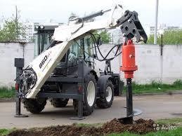 Аренда ямобура на экскаваторе-погрузчике Terex 860