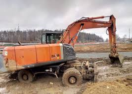 Экскаватора Case 580 N в аренду