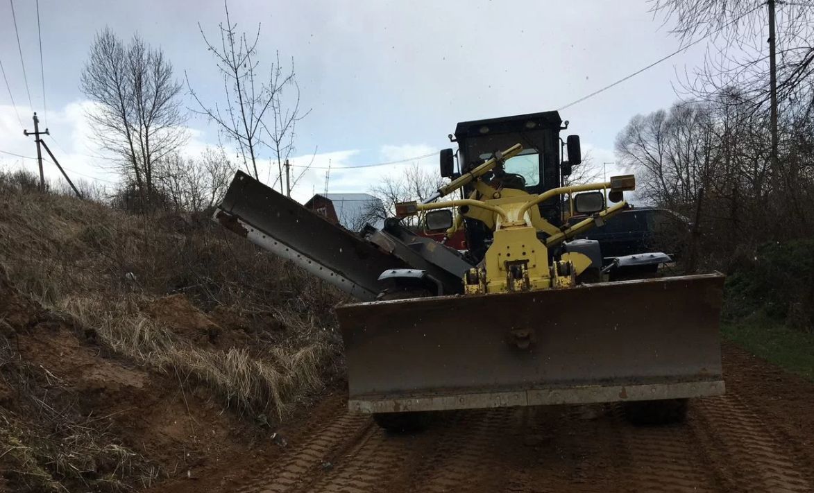 Грейдер Komatsu с оператором