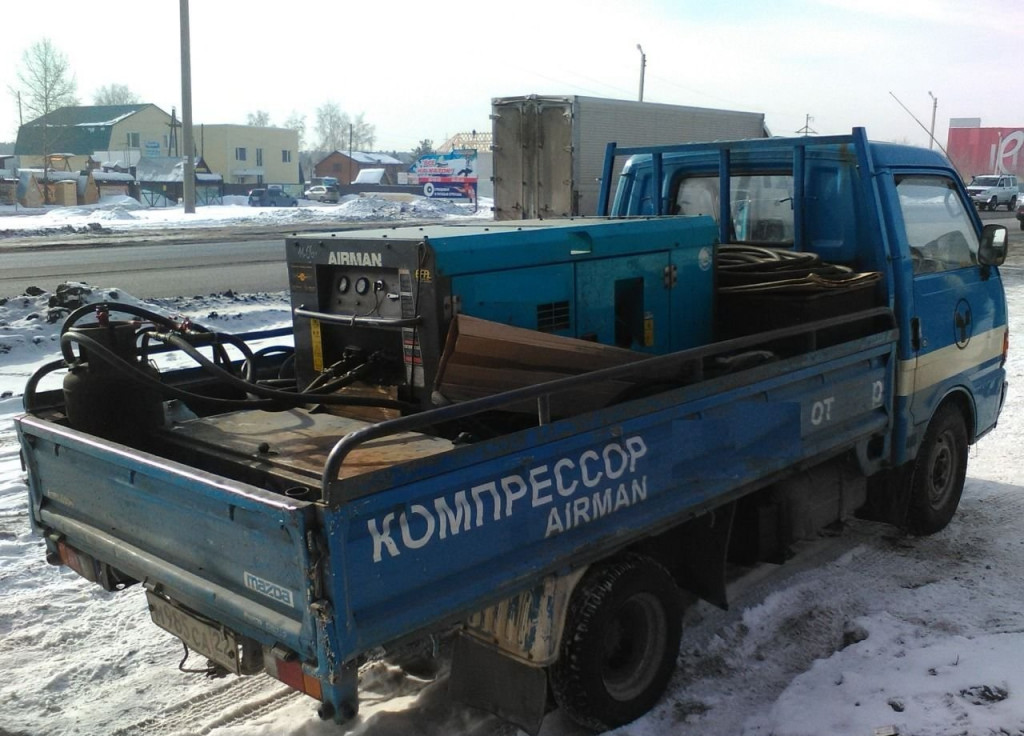 Компрессор с отбойными молотками