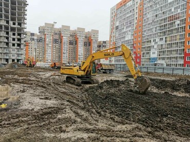 Строительный экскаватор в аренду