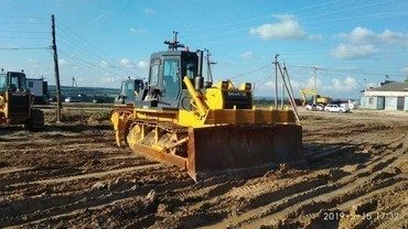 Услуги бульдозера с рыхлителем