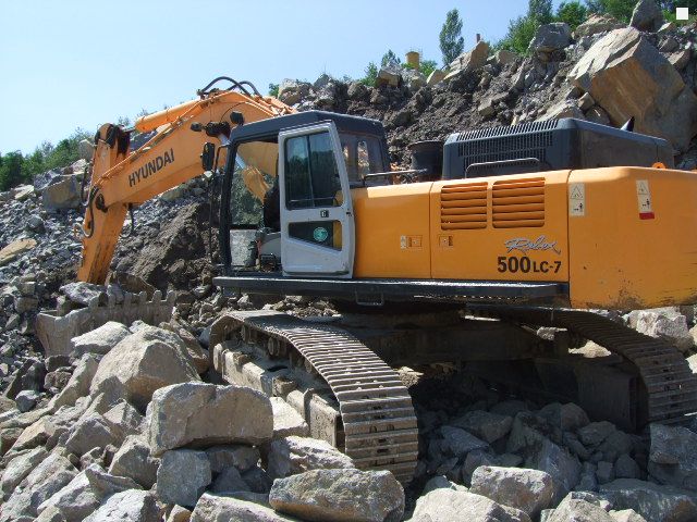 Услуги экскаватора HUYNDAI R500