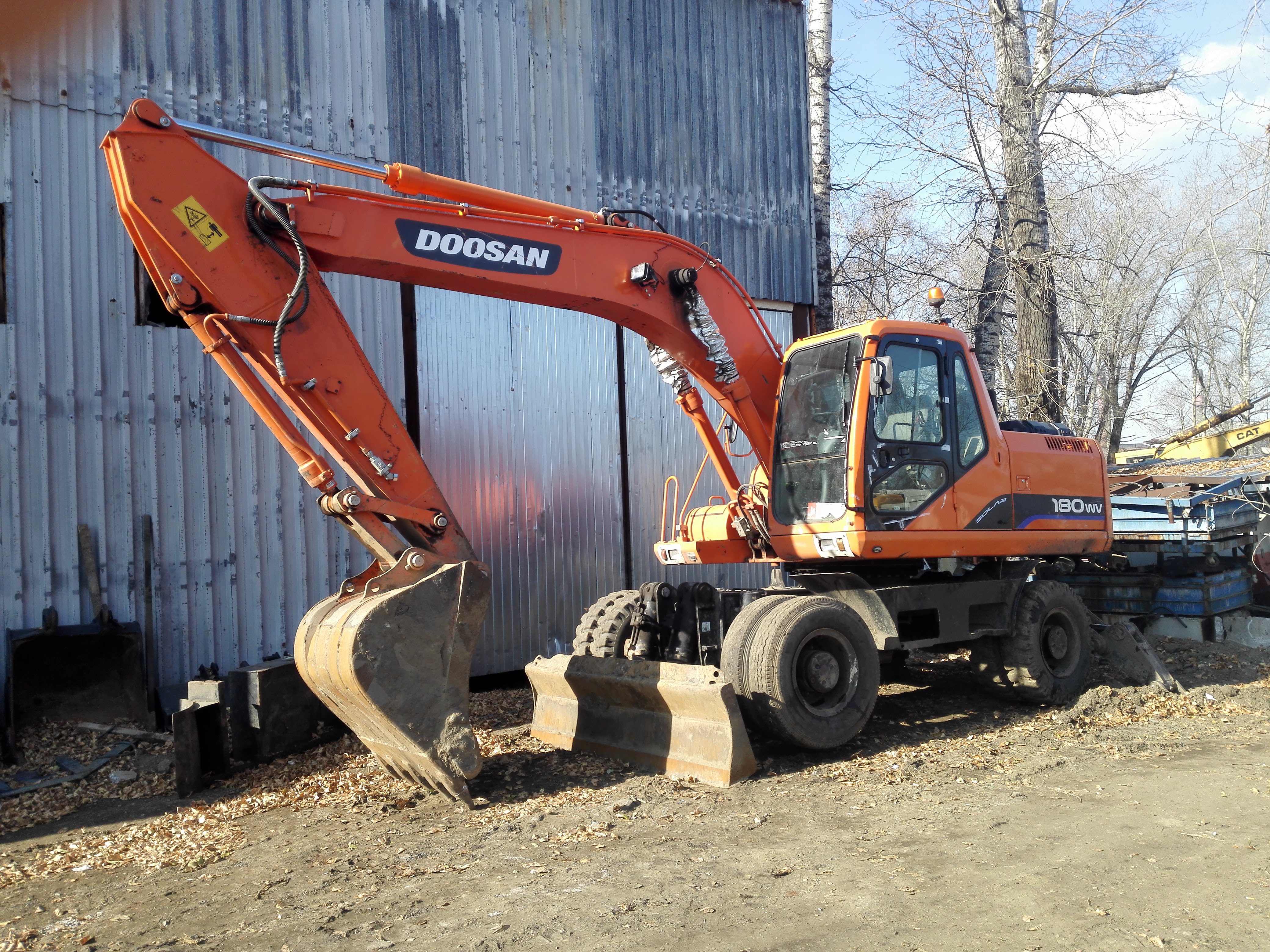 Услуги экскаватора колёсного Doosan ковш 1м3