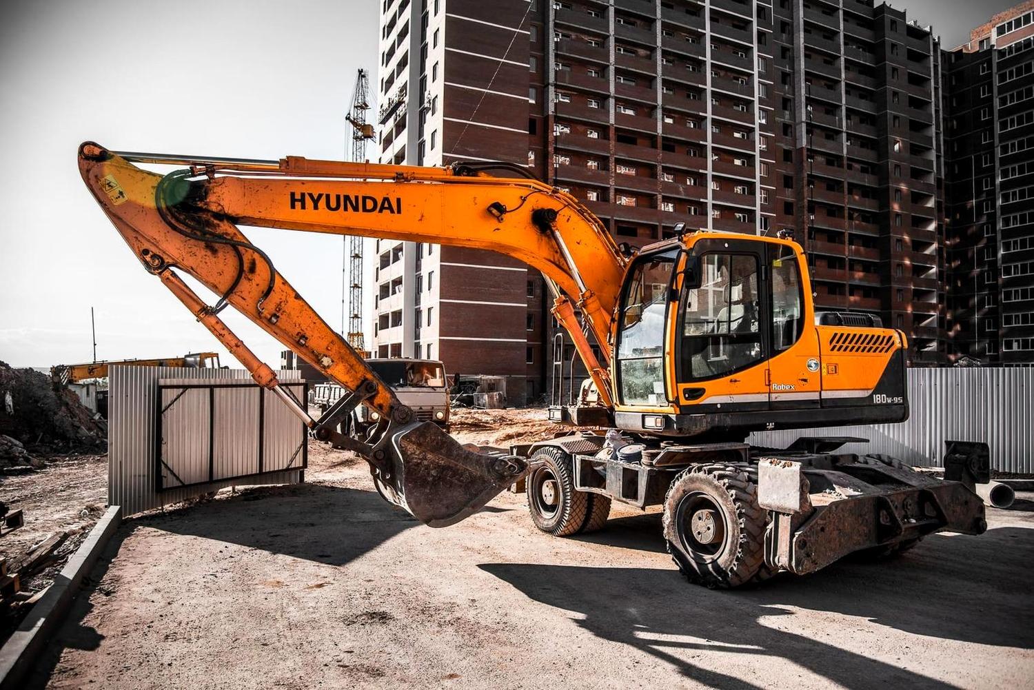 Услуги колесного экскаватора Liebherr A914C