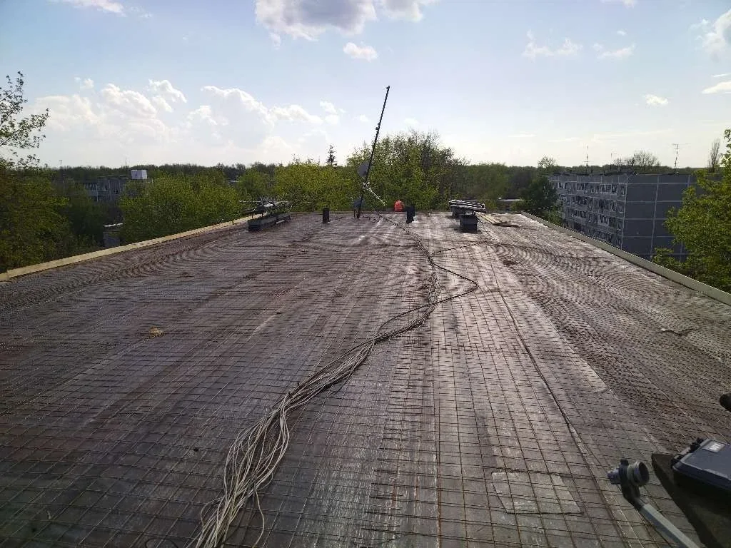 В микрорайоне Барыбино городского округа Домодедово специалисты ведут капитальный ремонт плоской кры