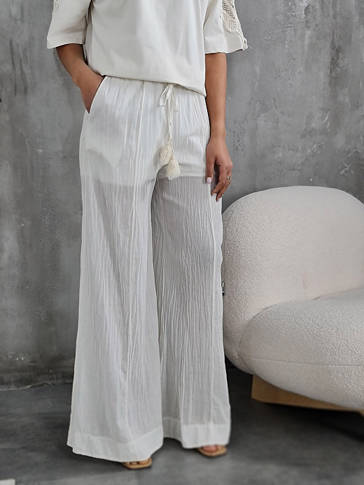 Брюки MIHOs прозрачные на завязках с помпончиком молочные 