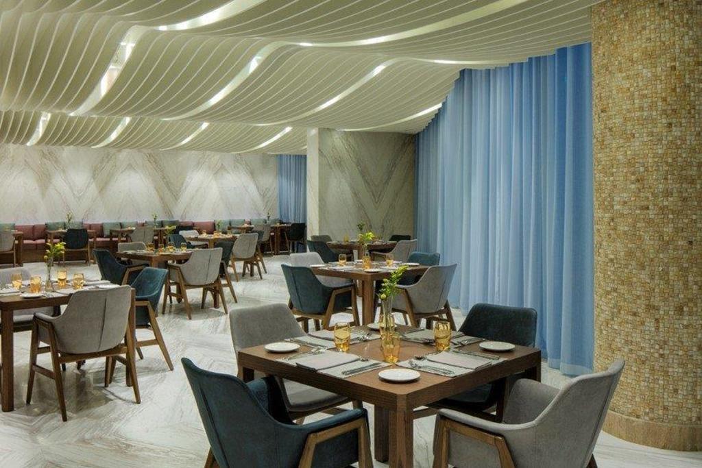 Radisson Blu Hotel Apartments Dubai Silicon Oasis. Фото 4