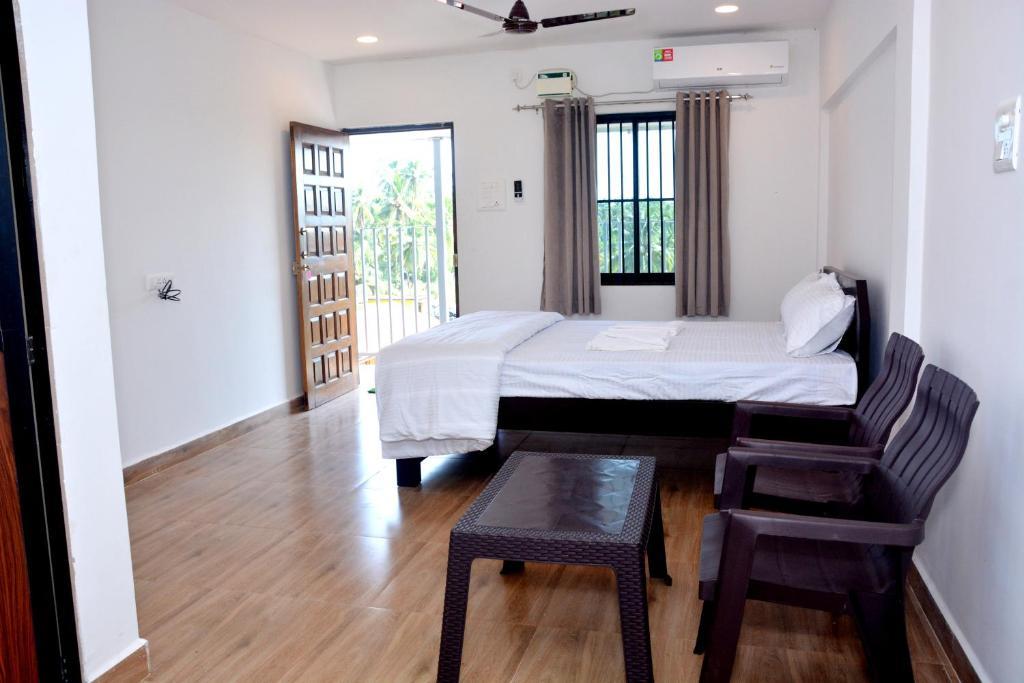 Anu The Guest House (Morjim). Фото 2