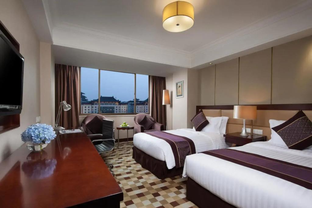 Jinjiang West Capital International Hotel. Фото 3