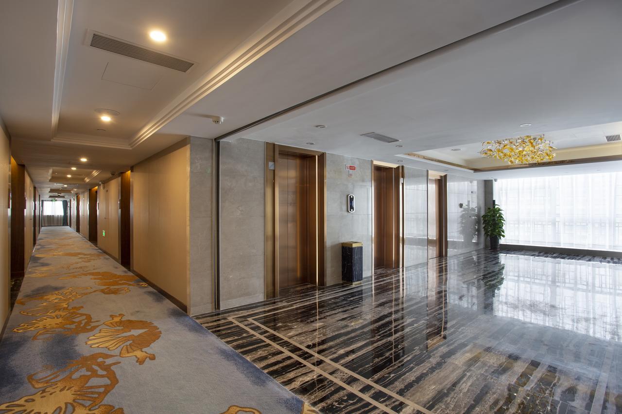 Sanya New City Hotel. Фото 4