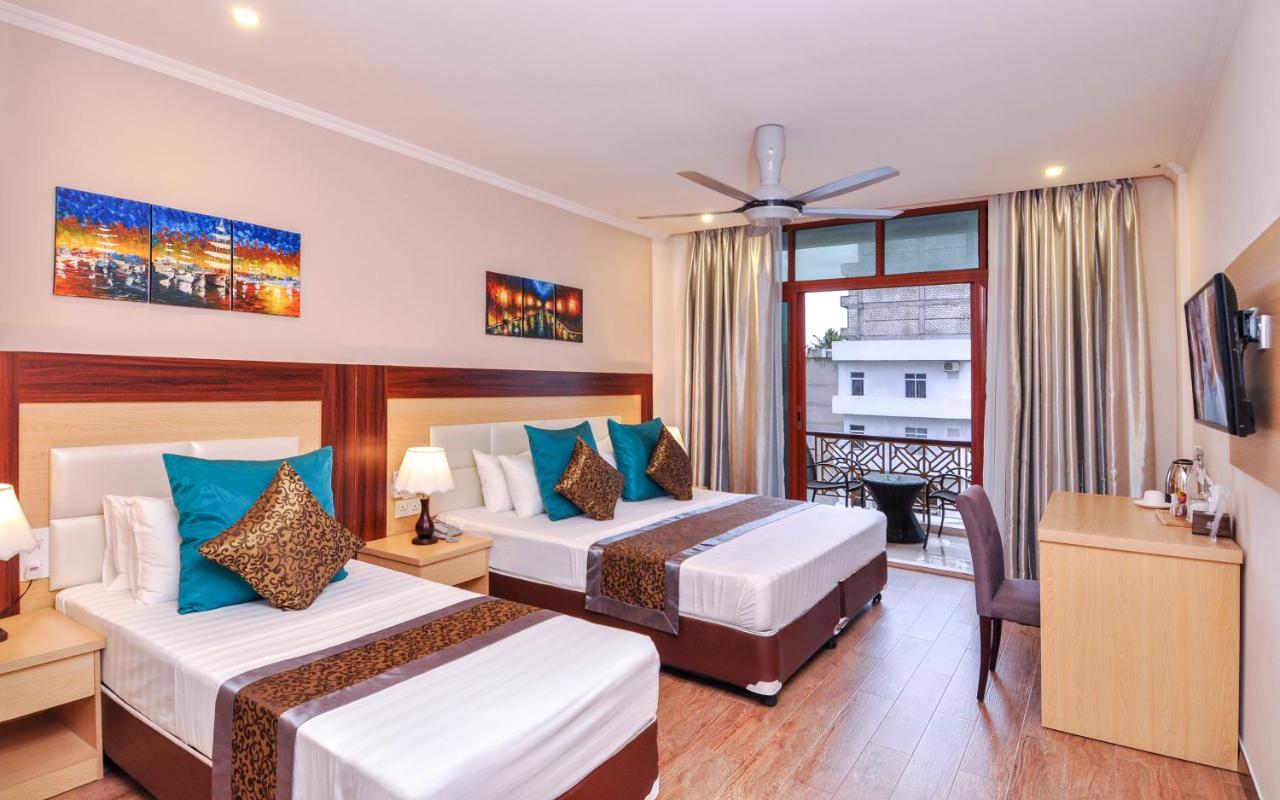 Triton Beach Hotel & Spa. Фото 4