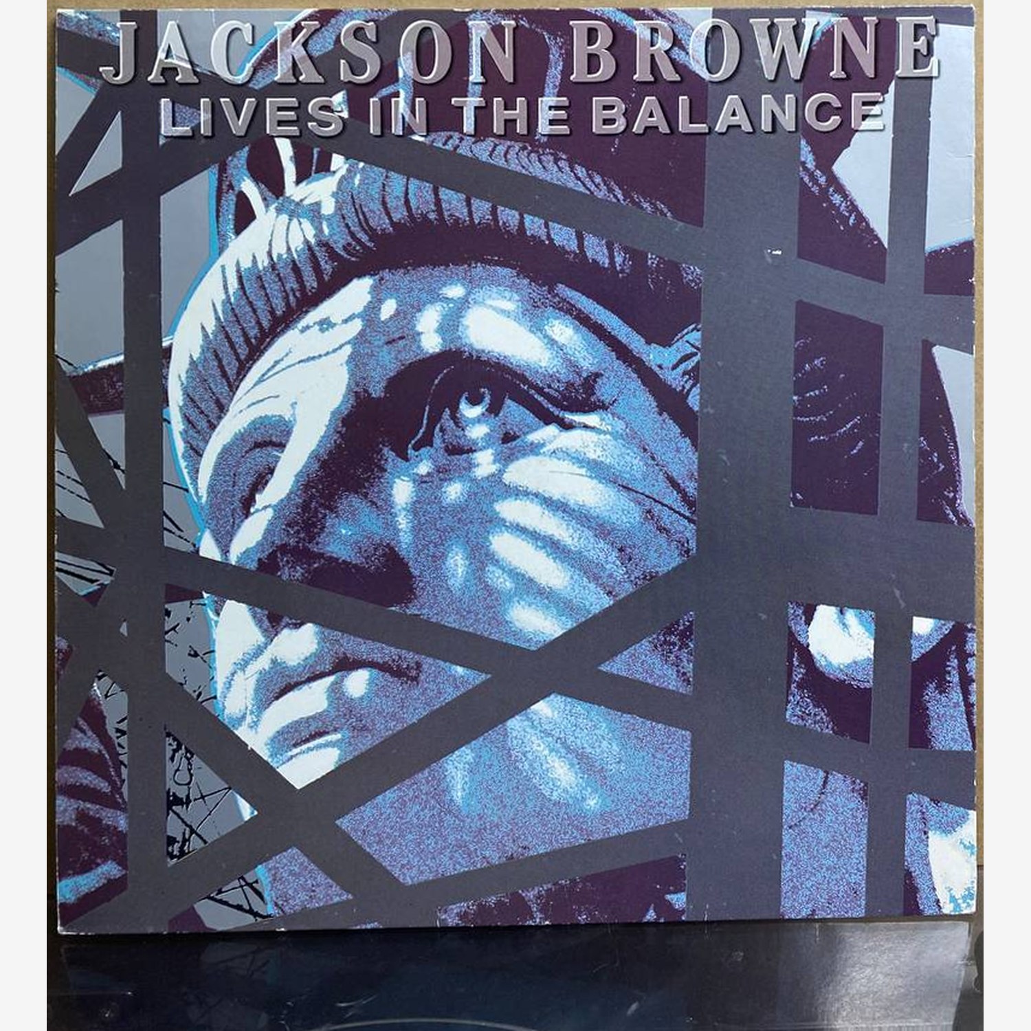 Jackson Browne — «Lives in the Balance» — виниловая пластинка LP — Германия, 1986 «Asylum Records» — лицевая сторона