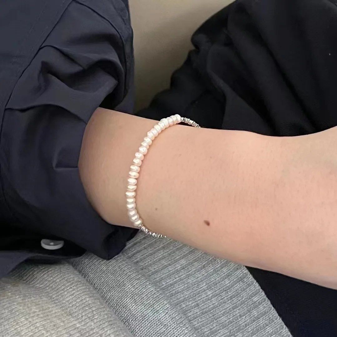 Серебряный браслет 925 пробы с жемчужинами и фрагментами серебра