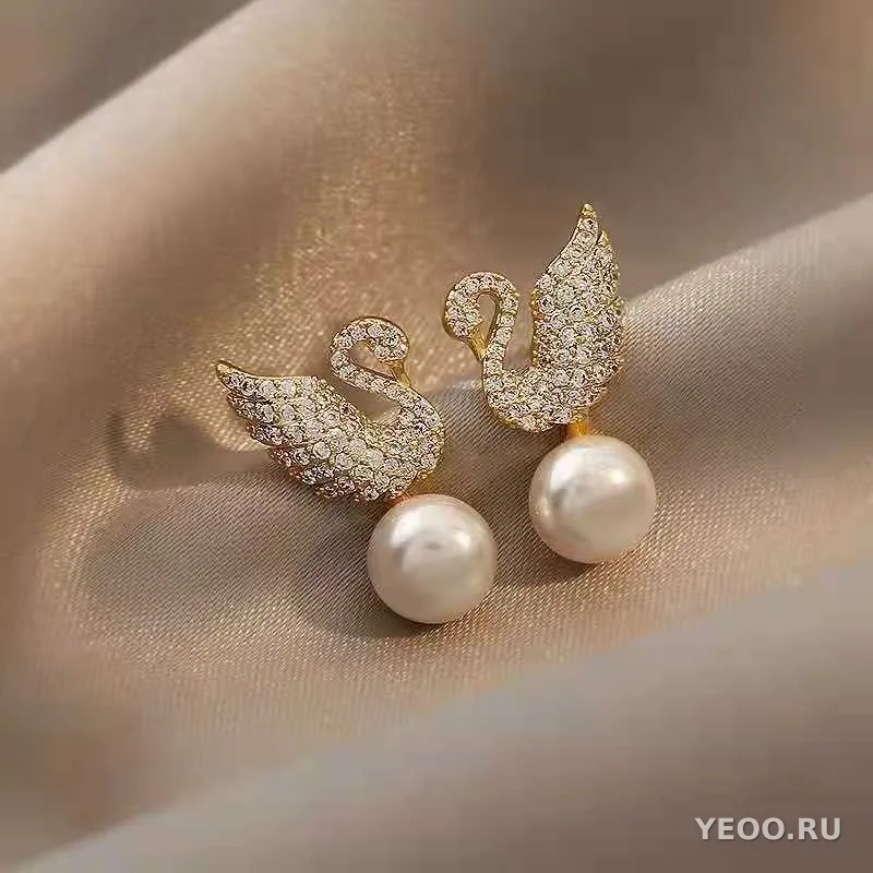 Сережки-гвоздики с жемчугом и бантиками, современный дизайн
