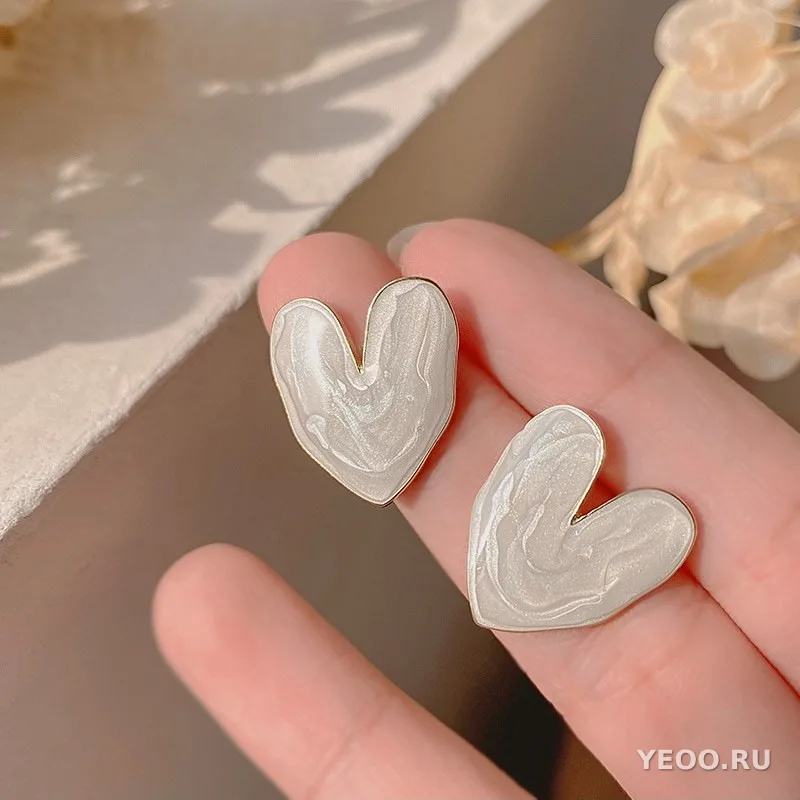 Сережки-гвоздики с жемчугом и бантиками, современный дизайн