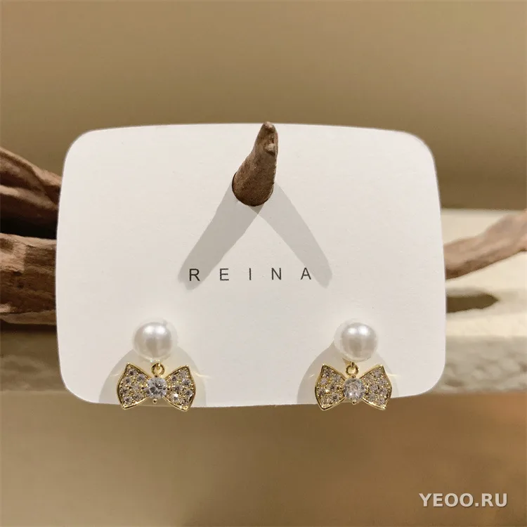 Сережки-гвоздики с жемчугом и бантиками, современный дизайн