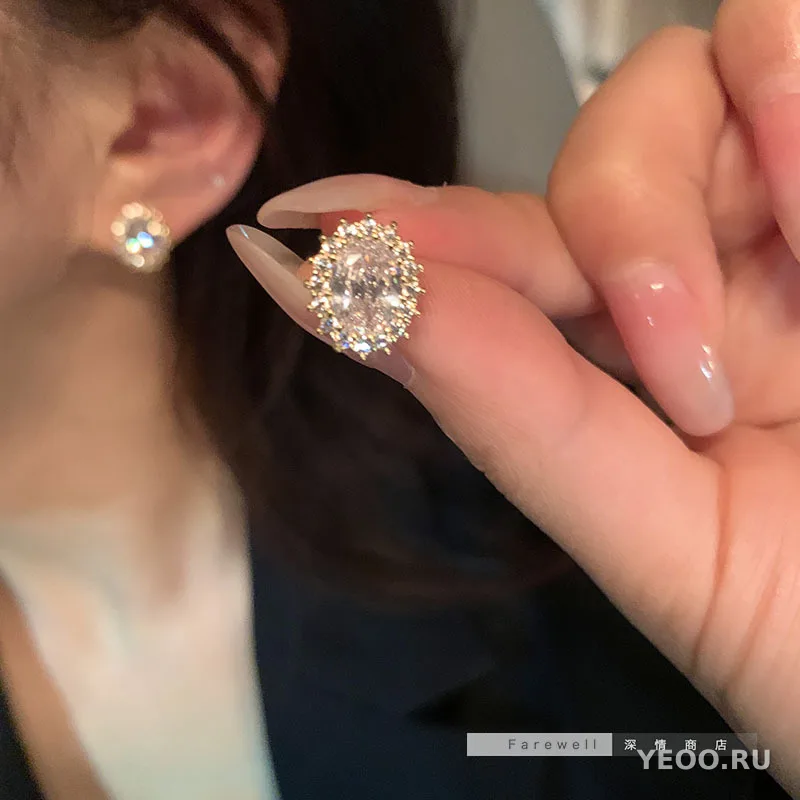 Серьги-подвески с жемчугом и цирконием на серебряной основе 925 пробы