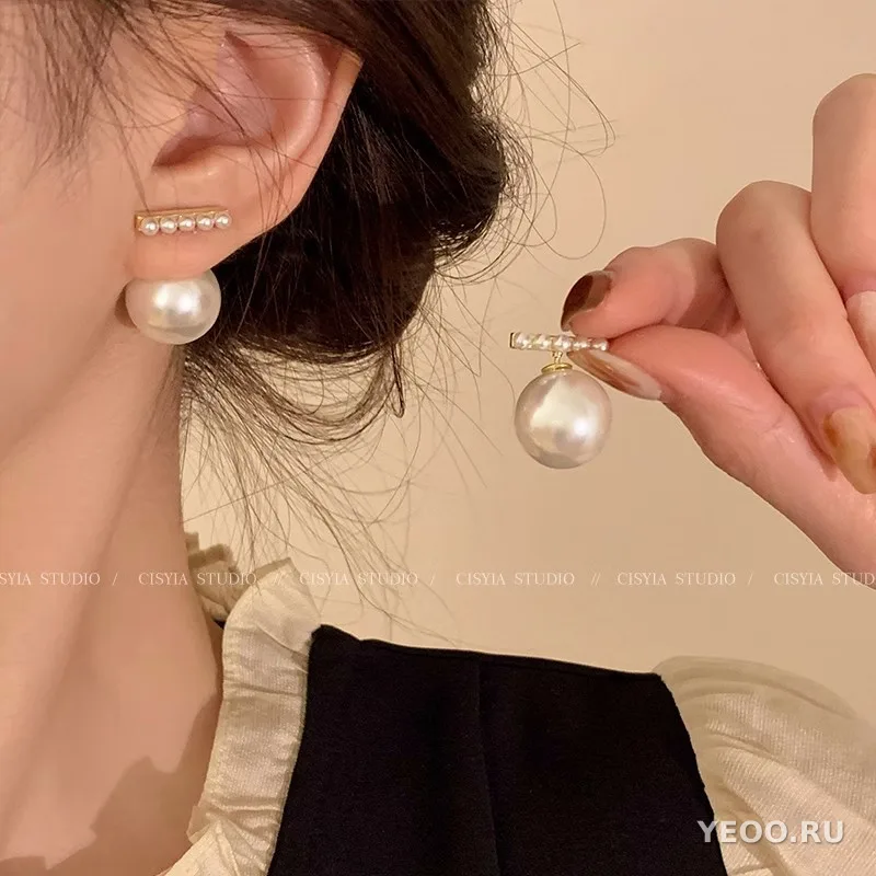Серьги-подвески с жемчугом и цирконием на серебряной основе 925 пробы