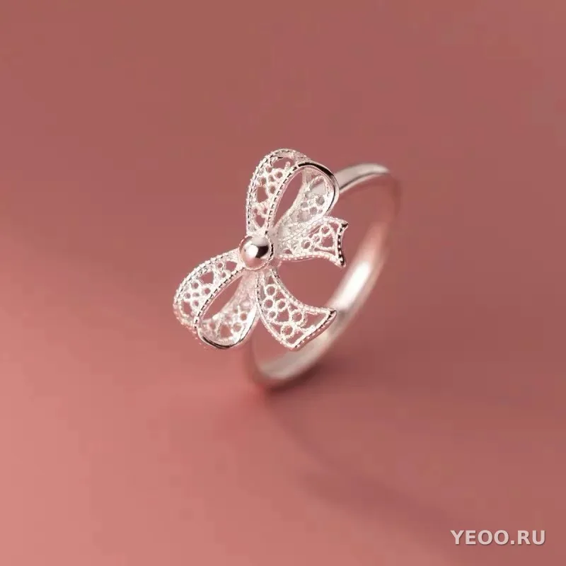 Кольцо из серебра с ажурным бантом, разомкнутое, женское, свежий стиль